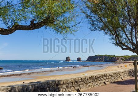 Hendaye, France - June 8: Tourists And Surfers Enjoy The Beach Of The Charming Seaside Resort Of Hen