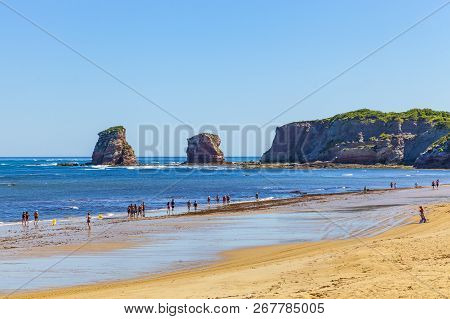Hendaye, France - June 8: Tourists And Surfers Enjoy The Beach Of The Charming Seaside Resort Of Hen