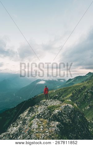 Man Hiking Alone In Mountains Adventure  Solo Traveling Solitude Lifestyle Concept Active Vacations 