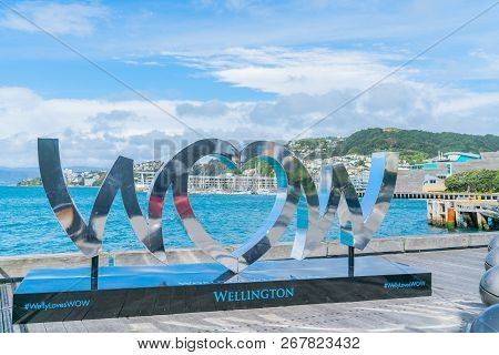 Wellington, New Zealand - October 1 2018; World Of Wearable Art Iconic Shiny Silver Wow Sign On City
