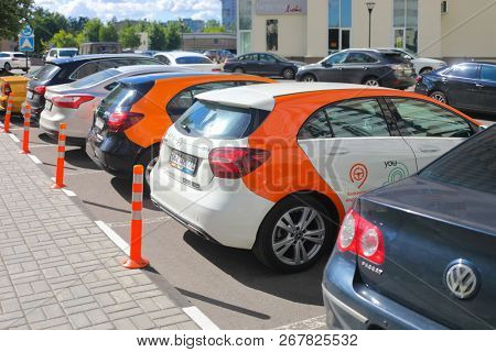 MOSCOW - JUN 20, 2018: Two Mercedes Benz cars of Moscow carsharing company You drive among other cars, carsharing is system of short-term car rental