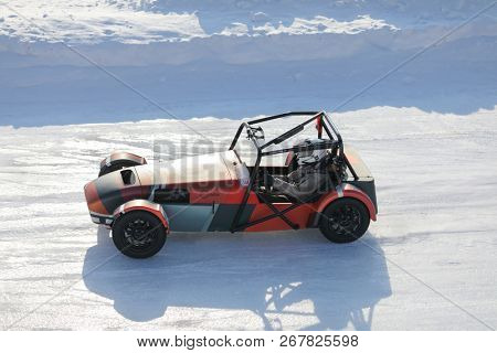 MOSCOW - MAR 2, 2018: First Russian serial racing car Shortcut moves at snowy track, developed by 527 design office in DK Racing Company