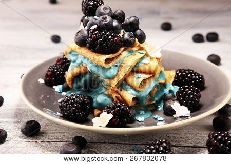 Delicious Tasty Homemade Crepes Or Pancakes With Blackberries,blueberries And Blue Spirulina Nicecre
