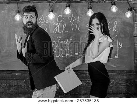 Role Games Concept. Student Lady Slapping On Teachers Buttocks With Book. Girl On Smiling Face Havin