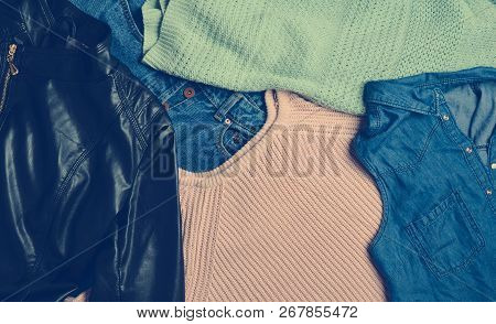 A Lot Of Different Women's Clothing. Sweater, Jeans Shirt, Jeans, Leather Jacket. Second Hand.