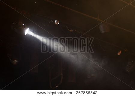 Single Flood Light In Theater With Artificial Smoke