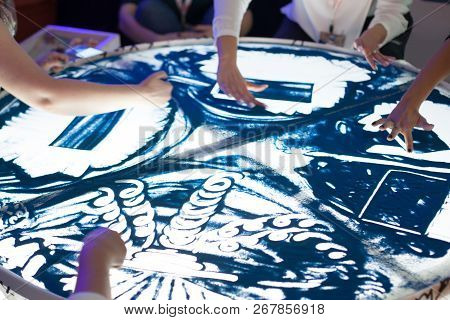 Sand Art Therapy Session With Many People