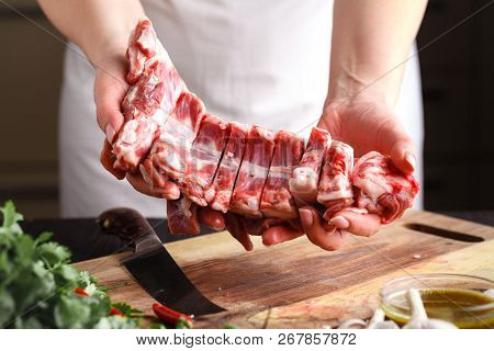 Close-up Cutting Fresh Meat For Cooking Meat Dishes