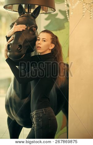 Woman With Natural Make Up And Serious Face. Sexy Girl Stands In Modern Interior. Girl Looks Sexi, F