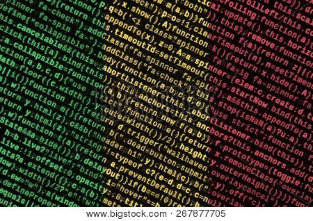 Mali Flag  Is Depicted On The Screen With The Program Code. The Concept Of Modern Technology And Sit