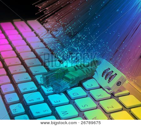 Sperre und Netzwerkkabel mit Computer-Tastatur-Hintergrund