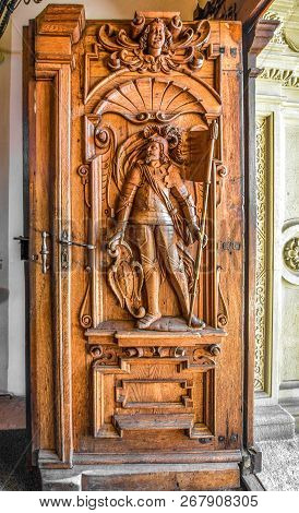 Lucerne, Switzerland - April 2017: Wooden Entrance Door To St Leodegar Church Interior