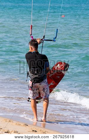 Shkorpilovtsi, Bulgaria - June 29, 2018: Man Kiteboarding At The Sea Beach. Kiteboarding Kitesurfing