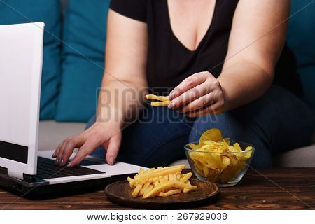 Mindless Snacking, Overeating, Lack Of Physical Activity, Laziness, Homebody. Fat Overweight Woman E