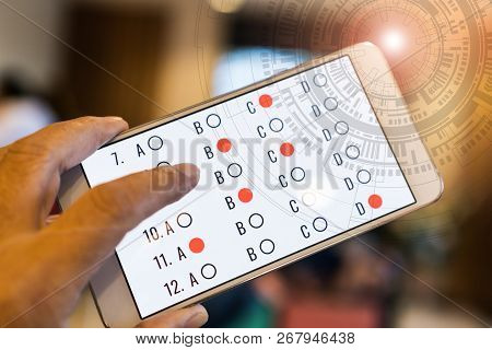 Student Testing E-learning Exam On Smartphone By Clicking With Sci Fi Futuristic User Interface Virt