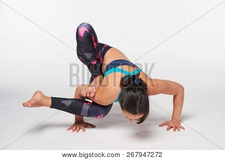 Full Length Woman Practicing Yoga Ekapada Yogadandasana Pose