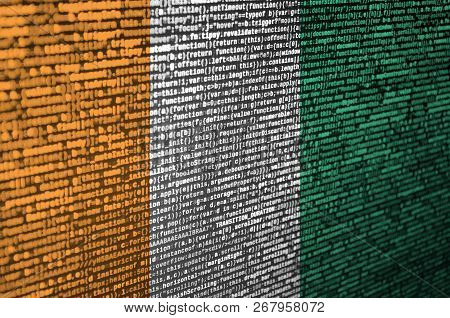 Ivory Coast Flag  Is Depicted On The Screen With The Program Code. The Concept Of Modern Technology 