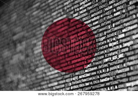 Japan Flag  Is Depicted On The Screen With The Program Code. The Concept Of Modern Technology And Si