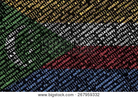 Comoros Flag  Is Depicted On The Screen With The Program Code. The Concept Of Modern Technology And 
