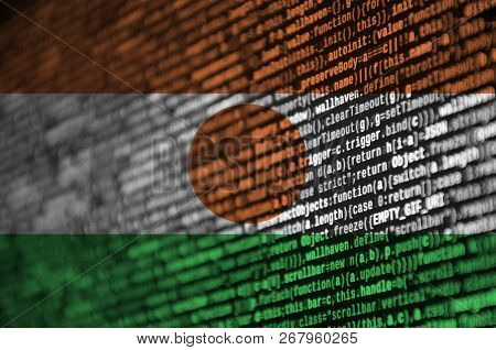 Niger Flag  Is Depicted On The Screen With The Program Code. The Concept Of Modern Technology And Si