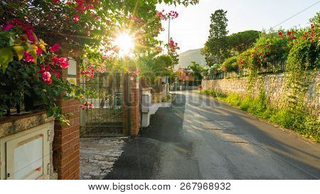 Street With Flower In Cefalu Town, Sicily Island, Italy
