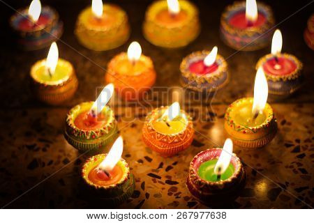 Earthen Diya Lamp Lighting With Candles On The Occasion Of Diwali And Sandhi Pujo
