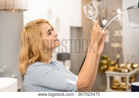 Woman Shopping At Homeware Store