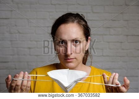 Young Woman Wearing Kn-95 Protection Medical Mask. Prevention Of The Spread Of Virus And Epidemic, P