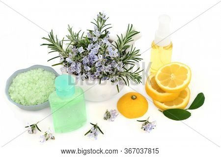 Rosemary herb & lemon skin care vegan beauty treatment with aromatherapy moisturising oil, gel & ex foliation salts on white. Anti ageing benefits & helps to reduce environmental skin damage.   
