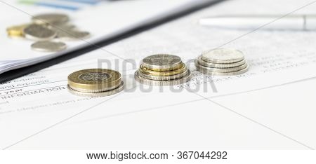 Close Up Of Coins To Stack Of Coins, Business Growth Concept, There Is Money Coins To Stack Of Coins