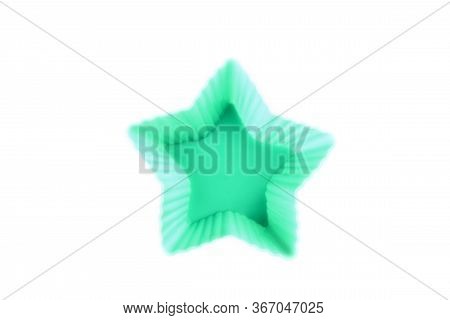 Silicone Star Shaped Cookie Baking Dish Isolated On A White Background. Green Dessert Baking Dish.