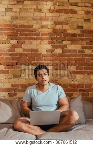 Young Mixed Race Man Chilling With Laptop Zt Home During Self Isolation