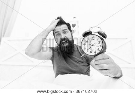 Stress Concept. Man Awake Unhappy With Alarm Clock Ringing. Insomnia Drives Me Crazy. Wakes Up In Mo