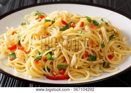 Spaghetti Aglio E Olio Italian For Spaghetti With Garlic And Oil Is A Traditional Pasta Dish From Na