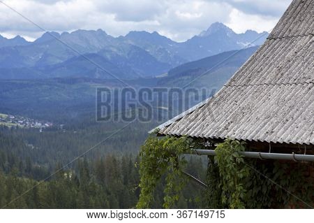 Beautiful Tatra Mountain Panorama With A Shed / Cabin Or A House In The Mountains In Front Closeup, 