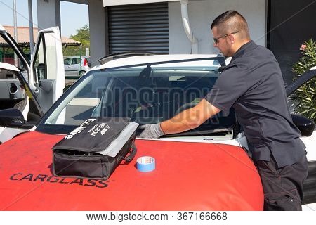 Bordeaux , Aquitaine / France - 04 26 2020 : Carglass Special Workers Replacing Windscreen Windshiel