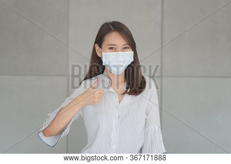 Business Employee Wearing Mask During Work In Office To Keep Hygiene Follow Company Policy.preventiv