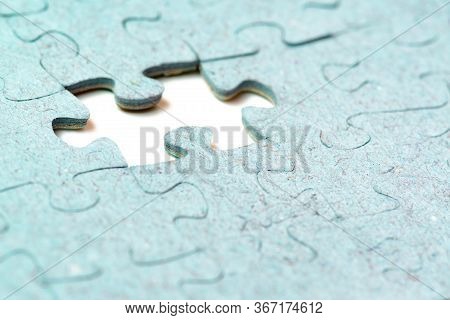 Missing Puzzle Piece. Business Creativity, Teamwork And Solution Concept. White Background.