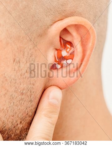 Earplugs For Noisy Places, Personally Molded Earplugs On Ear Close-up