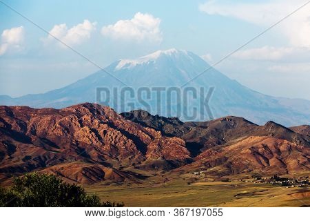 Snow Cap Of Mount Ararat Close-up. Ice Plateau. The Summit Of The Mountain. Blue Sky And Majestic La