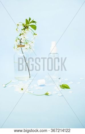 Vintage Glass Vase With Cherry Three Branch, Hand Antiseptic In Differrent Bottles And Beatiful Bloo