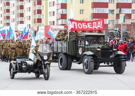 Novyy Urengoy, Russia - May 9, 2015: Soviet Army Truck Gaz Mm And Heavy Motorcycle Ural M67-36 At Th
