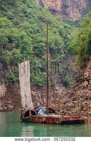 Wushan, Chongqing, China - May 7, 2010: Mini Three Gorges. Round Cabins On Sloops With Sail Docked W