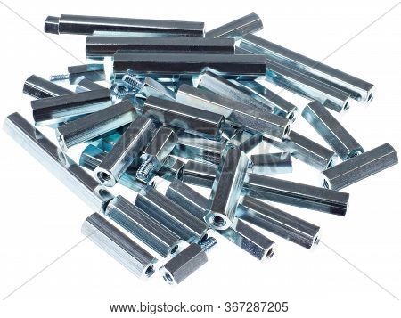 An Assortment Of Iron Standoffs Or Spacers, With Male And Female Ends