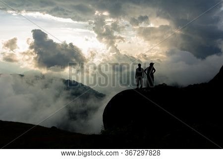Silhouette Manand Woman Standing On A Rock O : Mulayit Taung,moei Wadi,myanmar.