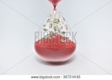 Hourglasses And Coin Isolated On White Background. Time As Money Concept. Money Inside Sandclock