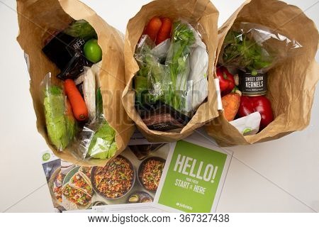 Sydney, Australia 2020-05-16 Hello Fresh Meal Kits In A Paper Bags On A White Table