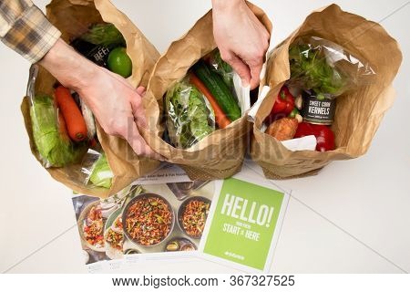 Sydney, Australia 2020-05-16 Hello Fresh Meal Kits In A Paper Bags On A White Table