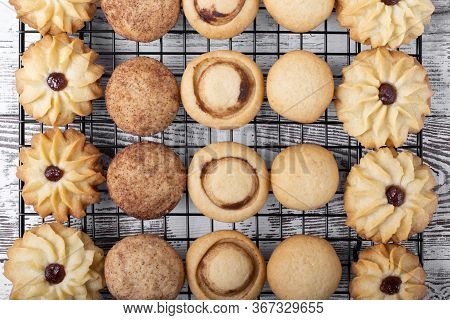 Shortbread Cookie Assortment On The Pastry Lattice On The White Wooden Table. Top View