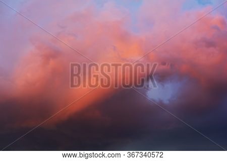 Dramatic Sky With Bright Red And Dark Blue Stormy Clouds. Nature Background. Soft Focus